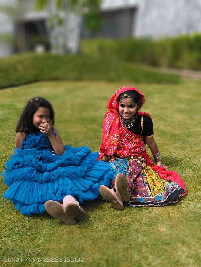 Nothing Phone (2a) Camera Review - a well-lit photo photo of two young girl in ethnic dresses taken in the morning or late afternoon