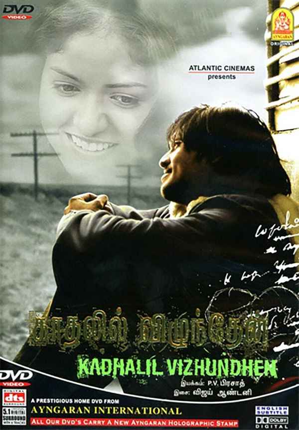 Kadhalil Vizhunthen Poster 1