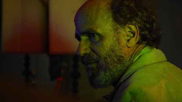 Man Under Table Poster 4