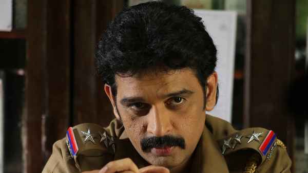 Marainthirunthu Paarkum Marmam Enna Poster 2