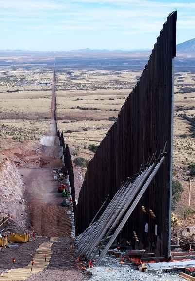 Under the Shadow of the Wall
