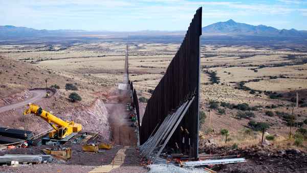 Under the Shadow of the Wall Poster 1