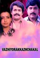 Vazhiyorakkazhchakal Poster 6