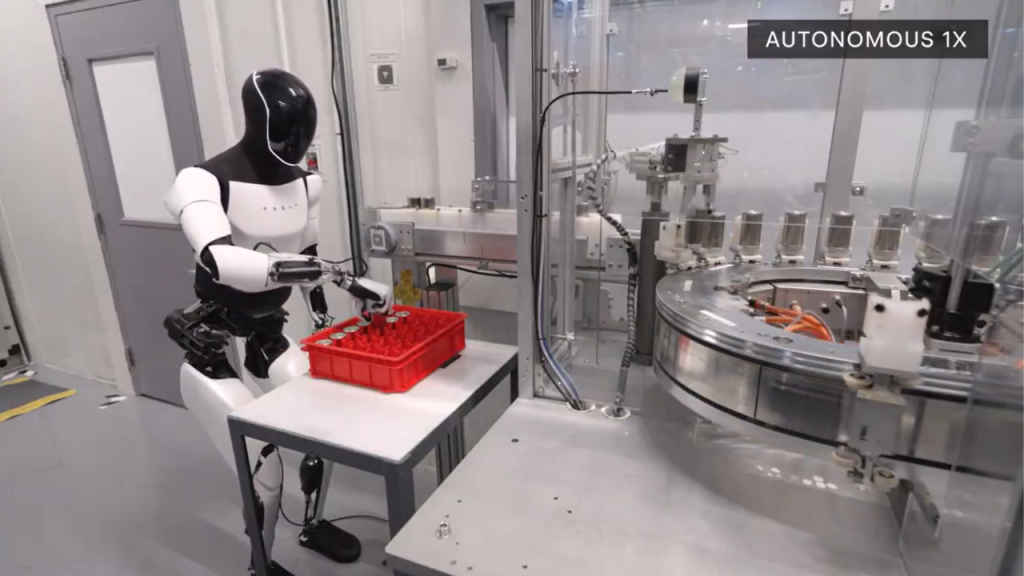 Watch Tesla Optimus robot sorting batteries & strolling through factory
