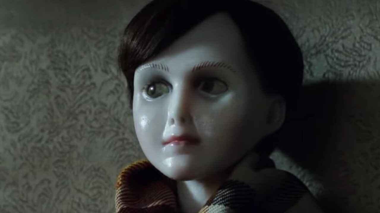 creepy boy doll