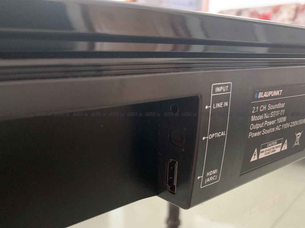 The HDMI port, AUX port and optical port are in a cavity at the back of the soundbar 