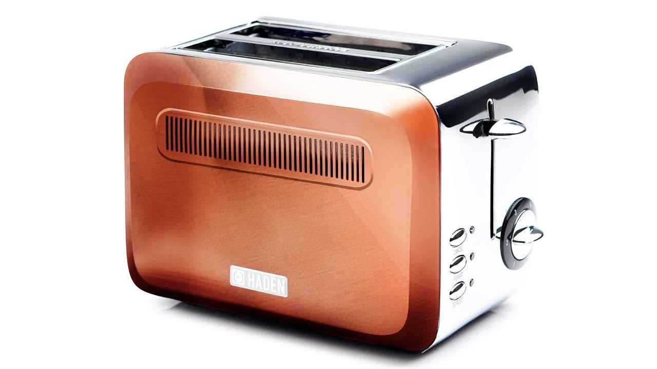 Top pop-up toasters with reheat and defrost functions