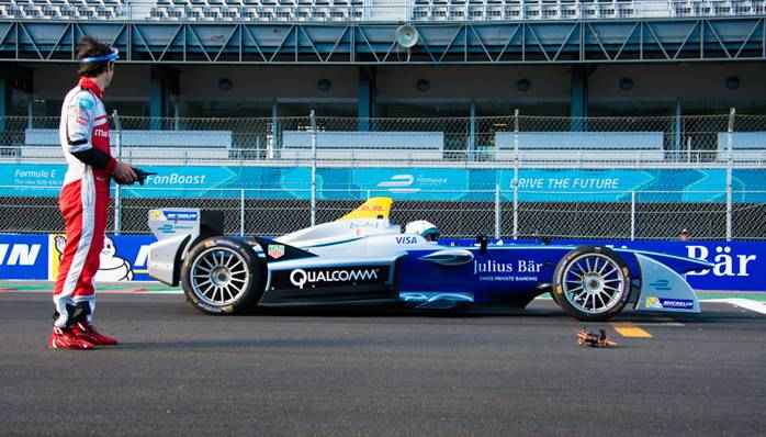 Watch Bruno Senna take on a Formula E race car with a drone